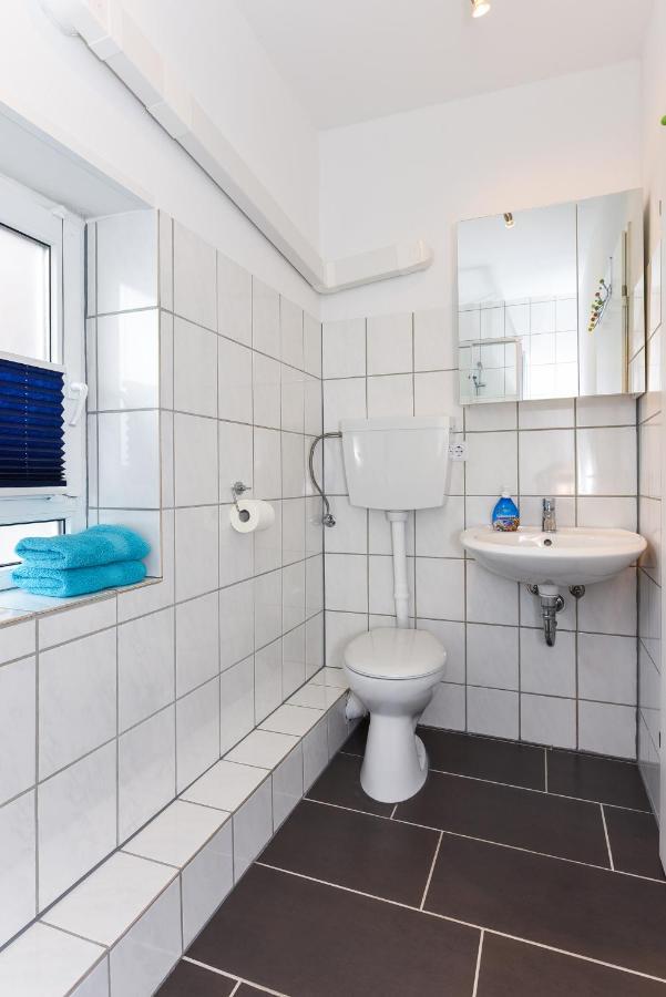 Ferienwohnungen Im Haus Waterkant Neuharlingersiel Extérieur photo